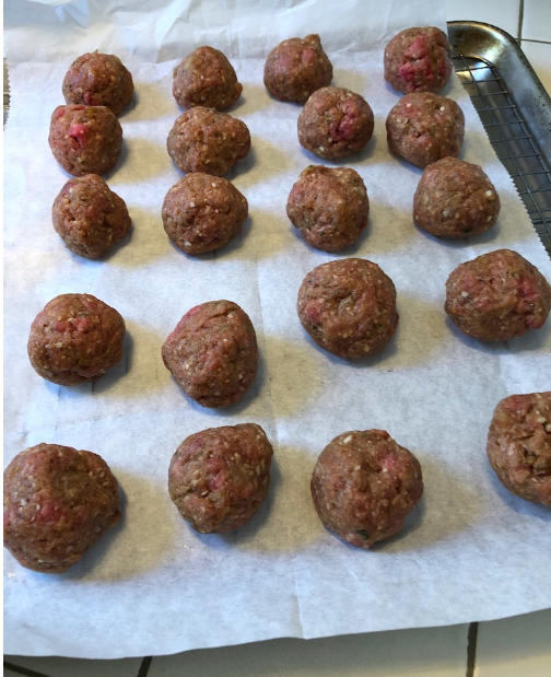 Cooked turkey meatballs on parchment