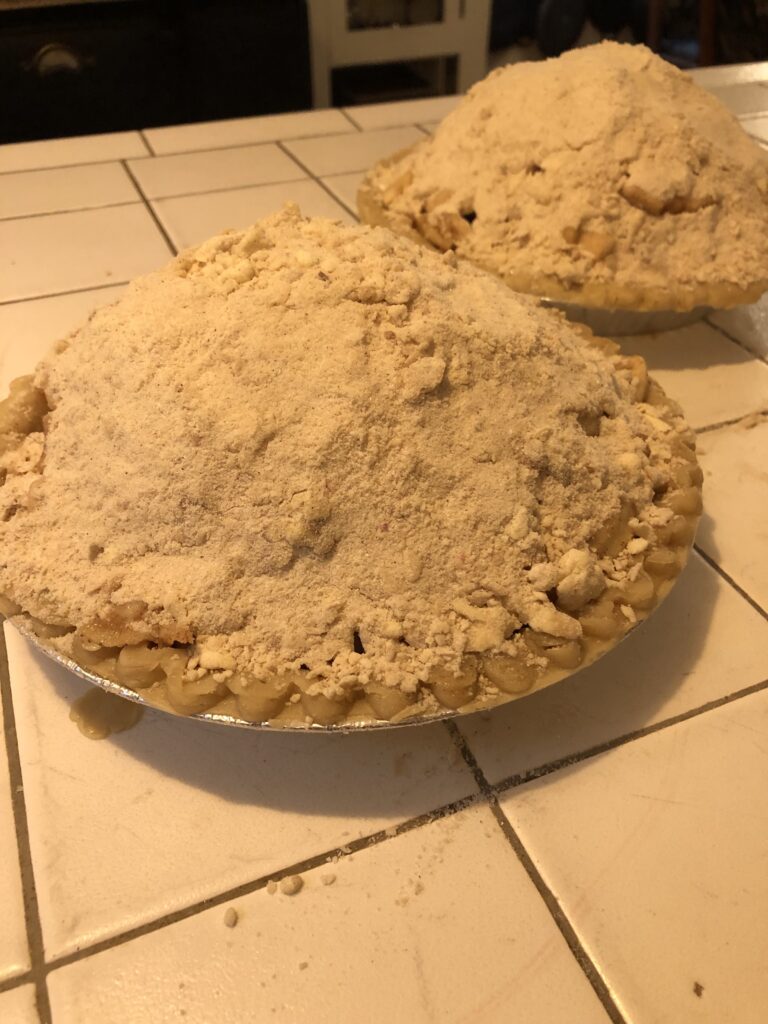 apple pie piled high with buttery crumb topping